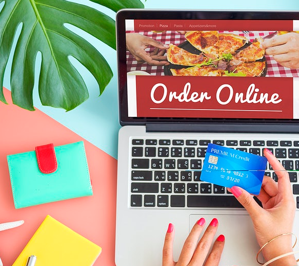 ordering food online on laptop